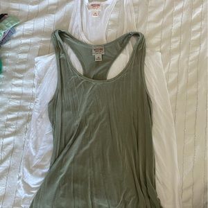 Green and white tanks